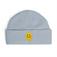 Dripping Smiley Cuff Beanie — Cozy Knit Hat with Yellow Drip Emoji Embroidery Hats Printify